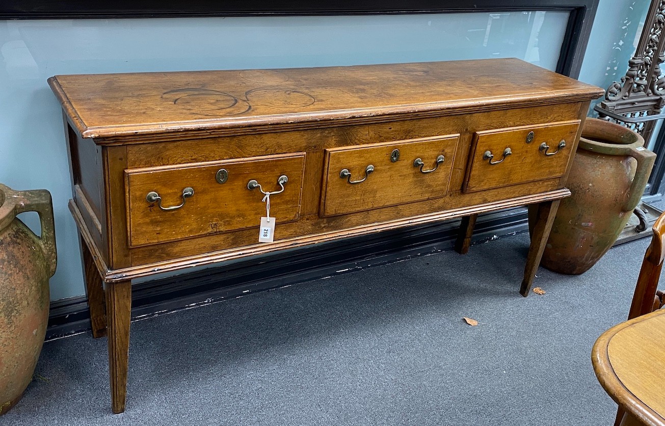 An 18th century elm and fruitwood low dresser, width 160cm, depth 41cm, height 82cm